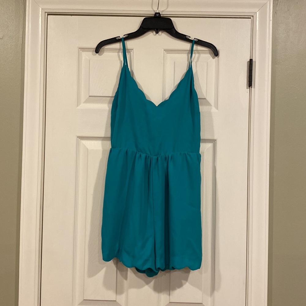 Teal romper with adjustable straps!